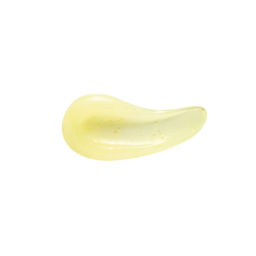 Yellow cream or gel on a white background Yellow cream or gel on a white background