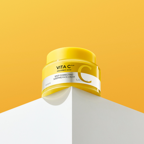 Yellow jar of VITAC skincare product on a yellow and white background Yellow jar of VITAC skincare product on a yellow and white background