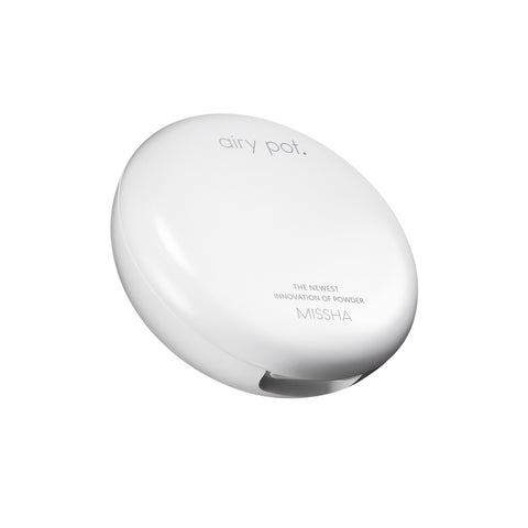 Angled view of the closed, white, minimalist compact packaging for the Missha Airy Pot Pressed Powder Pact. The packaging displays the product name 'airy pot' and 'MISSHA', showcasing the sleek K-beauty setting powder compact design. Angled view of the closed, white, minimalist compact packaging for the Missha Airy Pot Pressed Powder Pact. The packaging displays the product name 'airy pot' and 'MISSHA', showcasing the sleek K-beauty setting powder compact design.