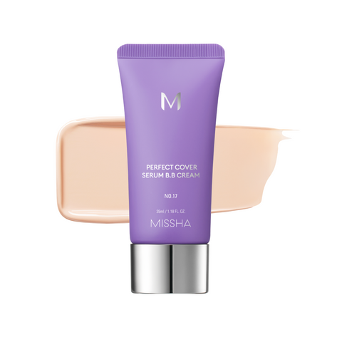 A tube of MISSHA M Perfect Cover Serum BB Cream with a swatch of the cream color next to it, indicating a light to medium tone with a cool or neutral undertone. A tube of MISSHA M Perfect Cover Serum BB Cream with a swatch of the cream color next to it, indicating a light to medium tone with a cool or neutral undertone.