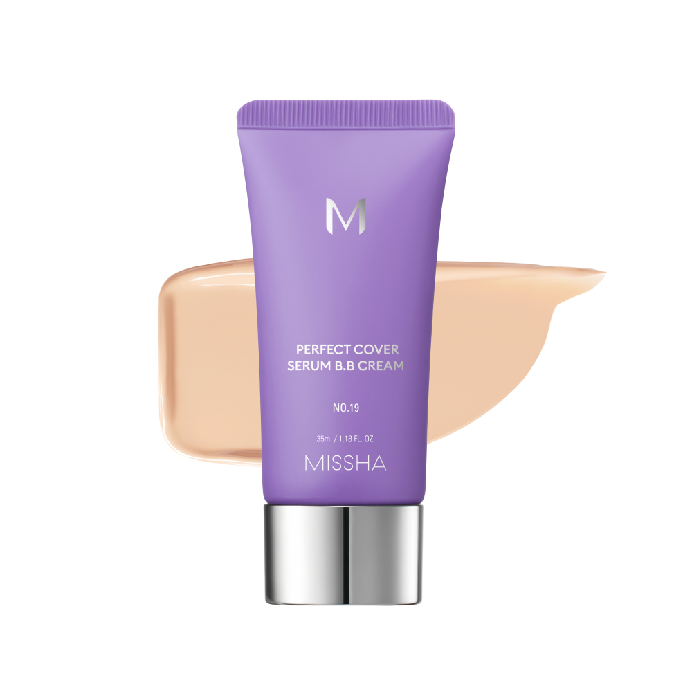A tube of MISSHA M Perfect Cover Serum BB Cream with a swatch of the cream color next to it, indicating a light to medium tone with a cool or neutral undertone. A tube of MISSHA M Perfect Cover Serum BB Cream with a swatch of the cream color next to it, indicating a light to medium tone with a cool or neutral undertone.
