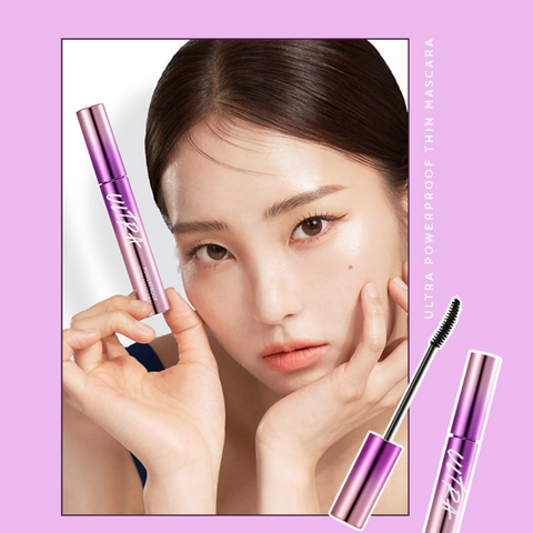 Model showcasing MISSHA Ultra Powerproof Thin Mascara for lifted, defined lashes with sleek holographic packaging Model showcasing MISSHA Ultra Powerproof Thin Mascara for lifted, defined lashes with sleek holographic packaging