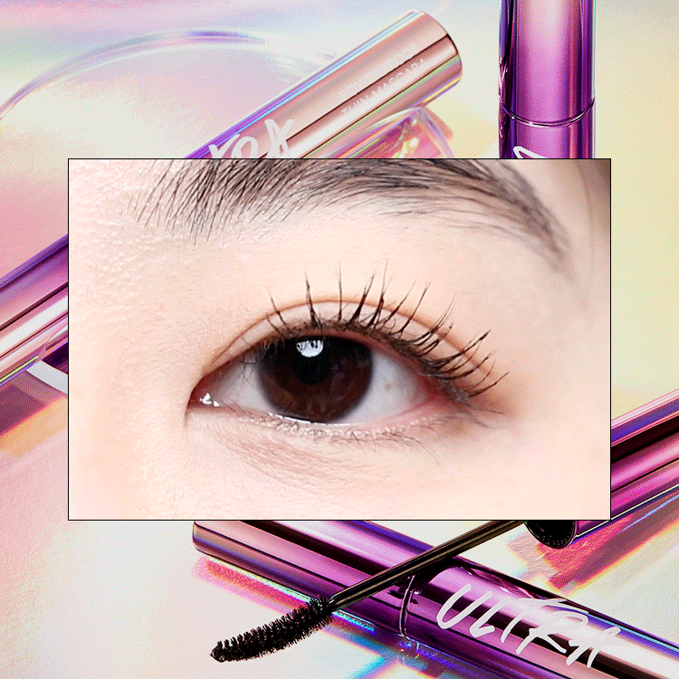 Application of MISSHA Ultra Powerproof Thin Mascara with a brush, displayed on a reflective surface with a colorful, holographic background. Application of MISSHA Ultra Powerproof Thin Mascara with a brush, displayed on a reflective surface with a colorful, holographic background.