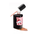 MISSHA Red Bean Retinol Pore Reset Ampoule bottle with a Teletubbies character on the pink label and a glass dropper resting on top, containing light pink serum.