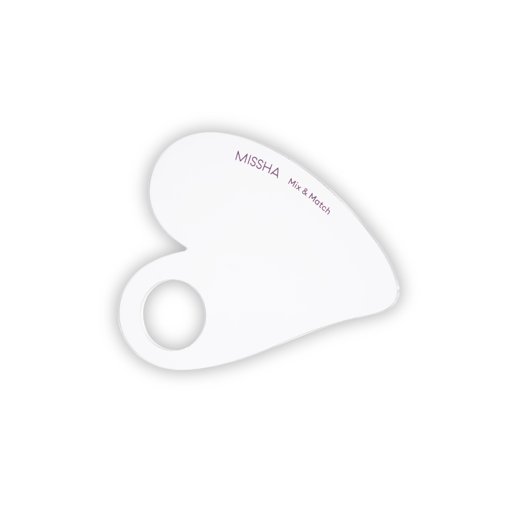 A clear, heart-shaped makeup palette with the brand name MISSHA written on it.