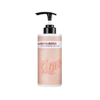 A pump bottle of Missha Dare Body Lotion with the text 'Love Begins' on the label.