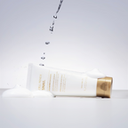 A tube of Missha Cell Renew Snail Foaming Cleanser dripping with water