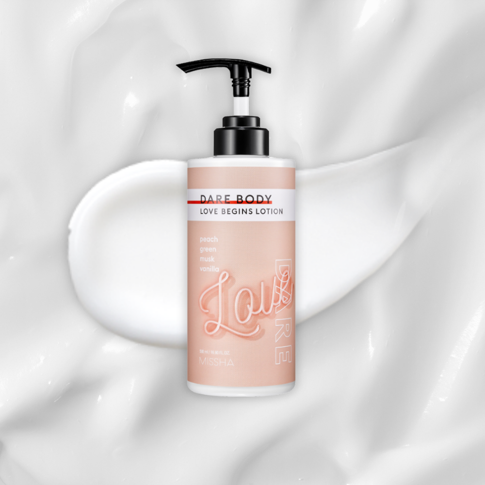 Product image of MISSHA Dare Body Love Begins Lotion. The bottle is a sleek beige tone with a black pump and white label, featuring text that lists fragrance notes of peach, green, musk, and vanilla. The background shows a creamy white lotion texture, emphasizing hydration and smoothness.
