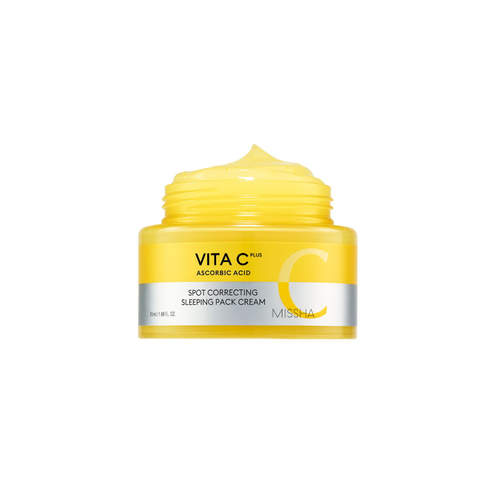 Yellow jar of Missha Vitamin C cream on a white background