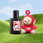 MISSHA Red Bean Retinol Pore Reset Ampoule featuring a Teletubbies character on the label, displayed on green grass beside a matching Teletubbies plush toy under a blue sky.