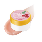 A'pieu Honey & Milk Daily Lip Mask container with the product applied to a lip, showcasing the pink color and texture of the lip balm.