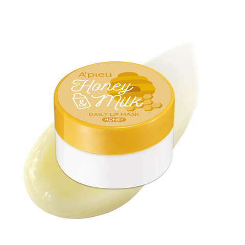 A'pieu Honey & Milk Daily Lip Mask container with the product applied to a lip, showcasing the pink color and texture of the lip balm.