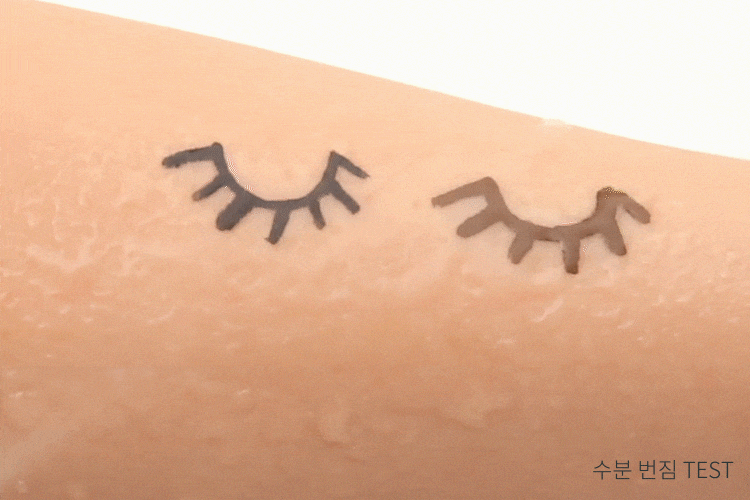 Eyeliner on model arm being shown as waterproof