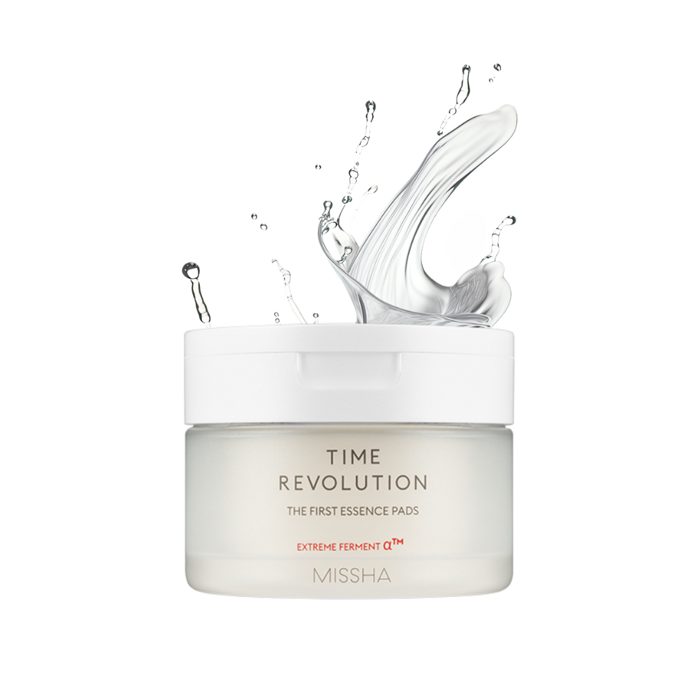 A jar of Missha Time Revolution The First Essence 5X Toner Pads with a dynamic splash effect on the label, indicating hydration and moisture.