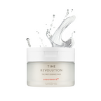 A jar of Missha Time Revolution The First Essence 5X Toner Pads with a dynamic splash effect on the label, indicating hydration and moisture.
