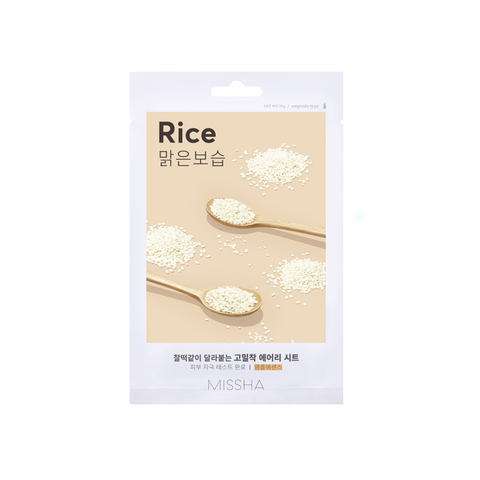 Product shot of the single Missha Airy Fit Sheet Mask in Rice. The packaging is white and beige, featuring the word 'Rice' and images of rice grains on wooden spoons, highlighting its brightening and deep moisturizing benefits for Korean skincare routines.