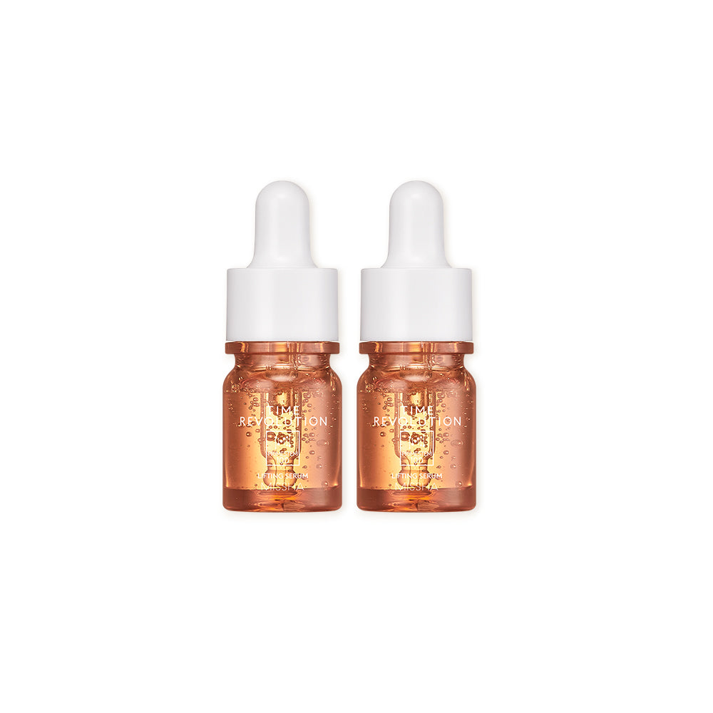 Two miniature travel-sized bottles of the Time Revolution Prime Stem 100 Lifting Serum with white dropper caps. These samples are part of the gift set, allowing users to try the powerful serum with Primestem 100 for 3D-lifting and anti-wrinkle benefits.