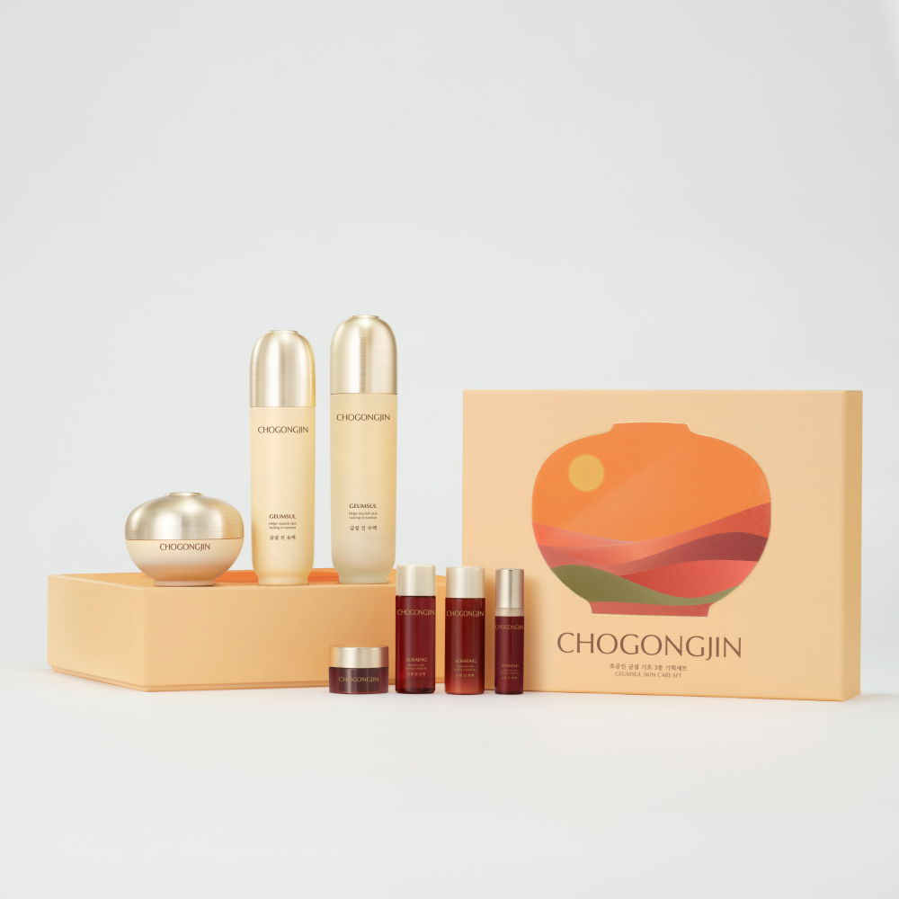MISSHA Chogongjin Geumsul Vitalizing Skincare Set with toner, emulsion, cream, and mini red ginseng samples in an elegant gold gift box inspired by traditional Korean design.