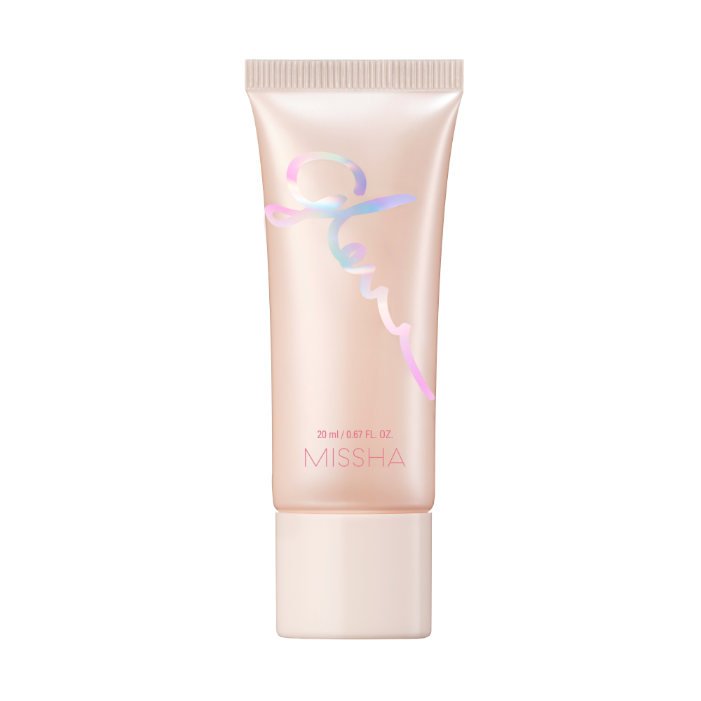 A closed container of Missha Glow Skin Balm with a pink and silver color scheme.