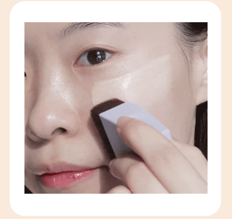 A model using the MISSHA layering fit brush by layering the foundation on her skin by using the layering brush.