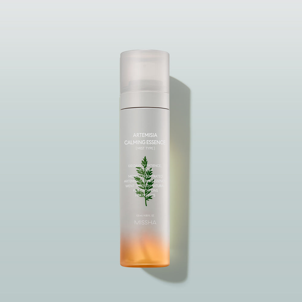 A bottle of 'Artemisia Calming Essence [Mist]' with a white cap and a label featuring a green plant illustration, set against a gradient background.