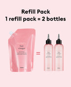 Graphic image showing a large pink A'pieu Raspberry Hair Vinegar Refill Pack pouch next to two smaller finished bottles of the same product. Text reads "Refill Pack: 1 refill pack = 2 bottles," highlighting the value and eco-friendly nature of the conditioning water rinse for a healthy scalp and shiny hair.