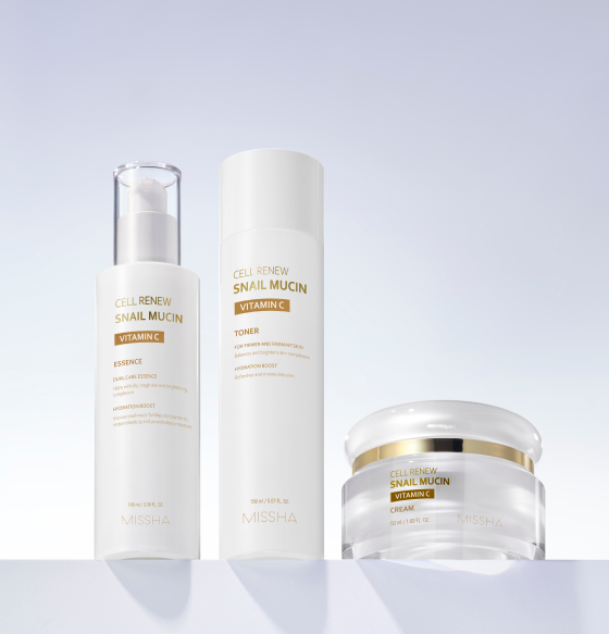 Missha Cell Renew Snail Mucin toner, essence, and cream elegantly displayed against a soft light background.