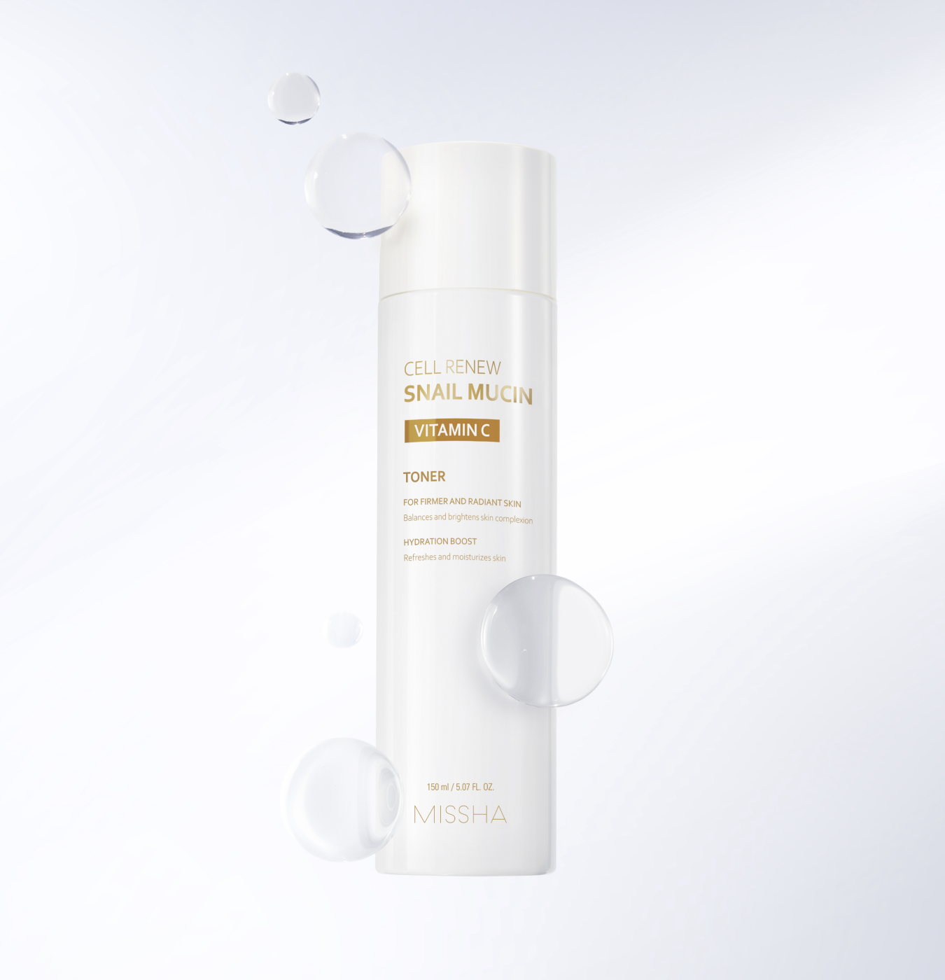 Studio shot of the Missha Cell Renew Snail Mucin Vitamin C Toner bottle standing upright, surrounded by large, floating water/serum droplets, suggesting deep hydration and a dewy finish.