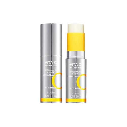 Two stick-shaped skin care products with yellow and white casing, labeled as Vita C Plus Ampoule Balm Stick.