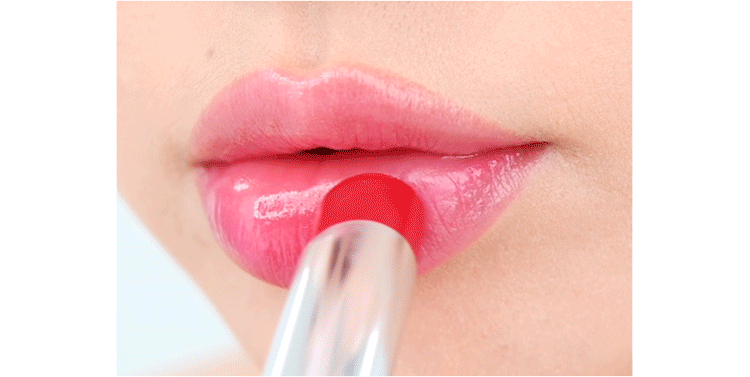 Close-up of soft pink glossy lips showing the hydrating and plumping effect of MISSHA lip care