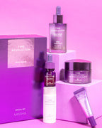 MISSHA Time Revolution Night Repair skincare special set arranged on a violet background, featuring ampoule, cream, essence, and eye cream in signature purple packaging