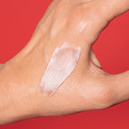 MISSHA Atelo Collagen 500 Power Plumping Cream applied on a hand to show texture