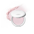 Missha Airy Pot. A compact white powder pact with a pressed powder formula, displayed against a white background. With a light pink trail of powder behind.