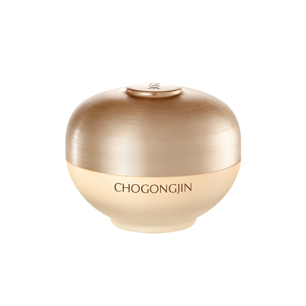 A jar of Chogongjin Geumsul Jin Cream with a gold-colored lid and label.