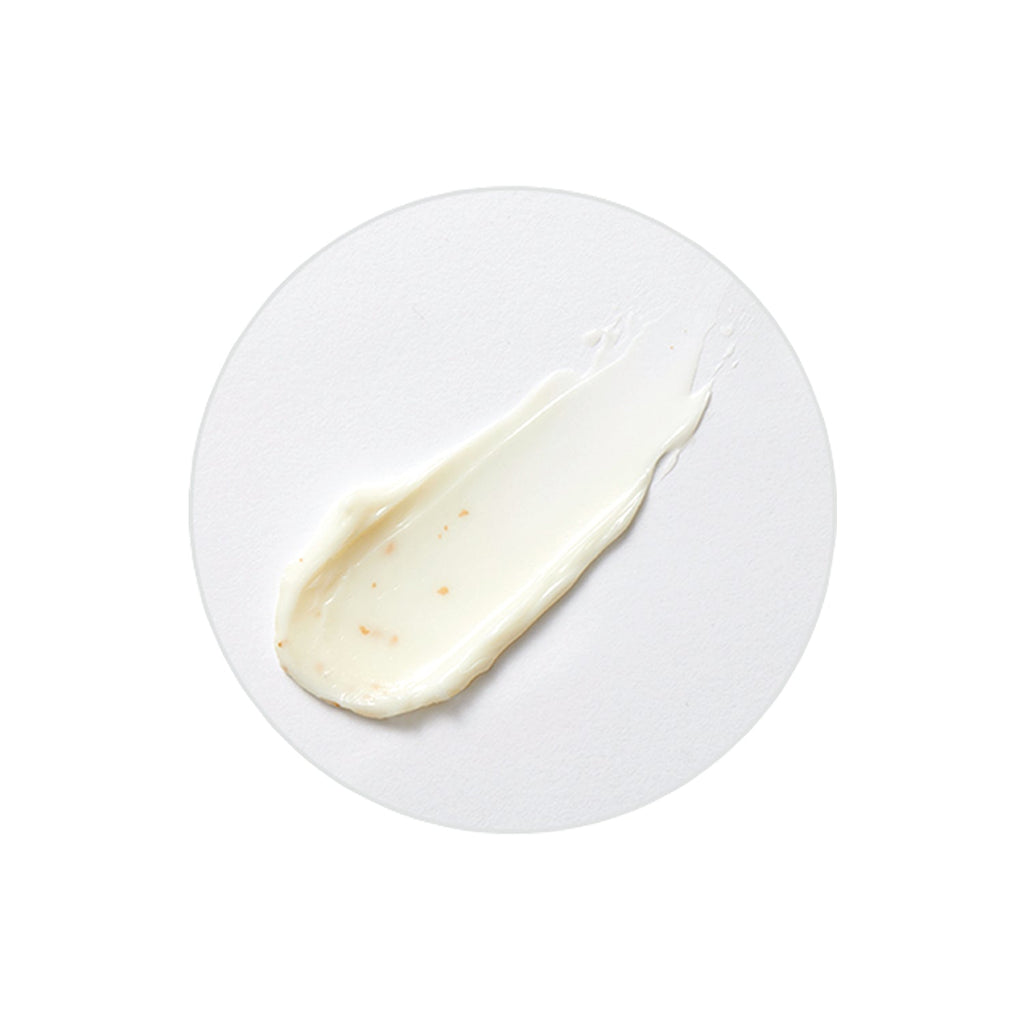 Chogongjin Geumsul Jin Cream 60ML rich cream swatch with visible golden flecks applied to a white circular surface luxury K-Beauty product texture detail.