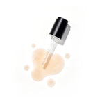 Overhead view of a black-capped dropper resting in a light, milky puddle of the Missha Time Revolution Night Repair Ampoule 5X. The image showcases the smooth, concentrated serum texture for overnight renewal.