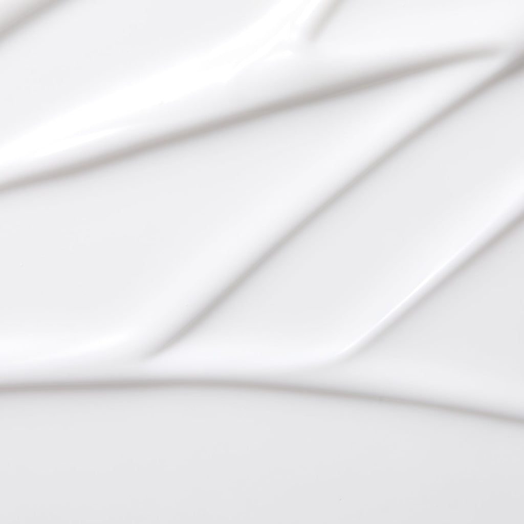 Close-up texture of MISSHA Chogongjin Youngan Jin Emulsion showing lightweight, silky smooth anti-aging formula for firm and hydrated skin.